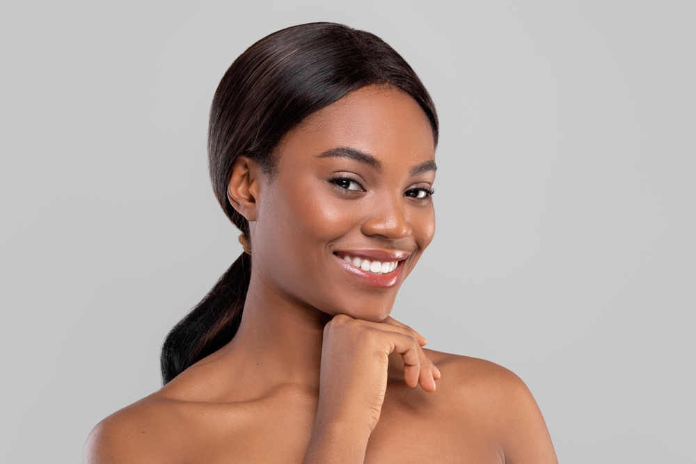 Portrait,Of,Smiling,Pretty,Millennial,African,American,Woman,With,Shining